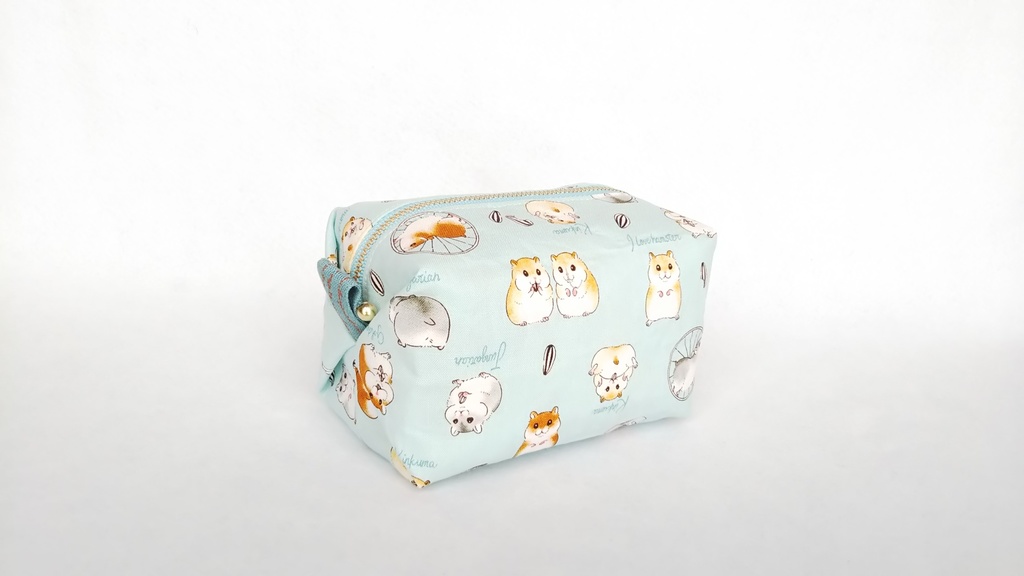 コロコロ🎵ハムスターのキャラメルポーチ