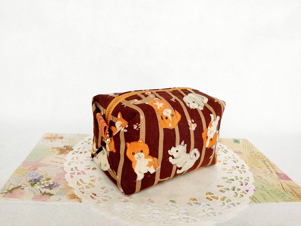 子犬のキャラメルポーチ