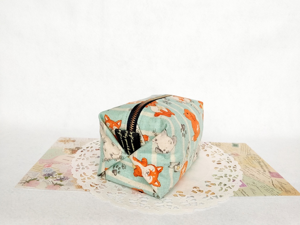 子犬のキャラメルポーチ