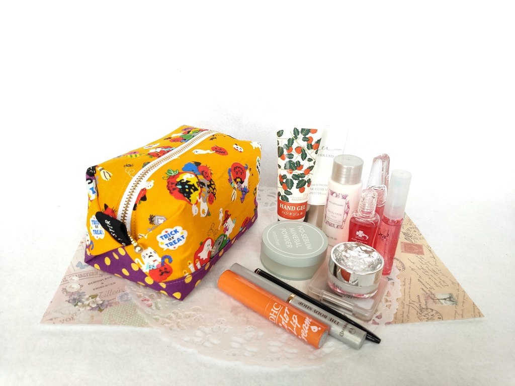 ハロウィン🎃キャラメルポーチ(オレンジ×ドット)