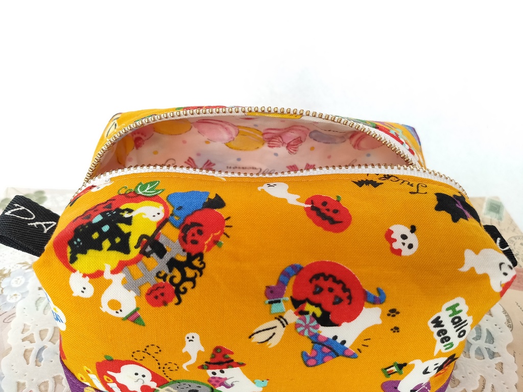 ハロウィン🎃キャラメルポーチ(オレンジ×ドット)