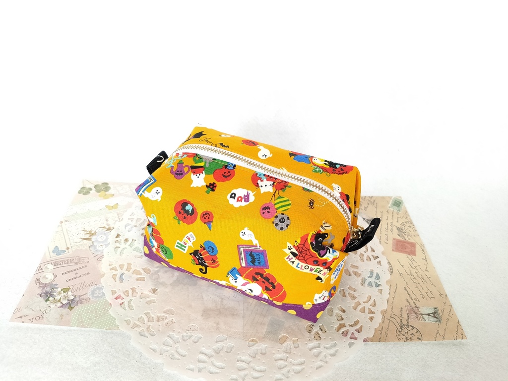 ハロウィン🎃キャラメルポーチ(オレンジ×ドット)