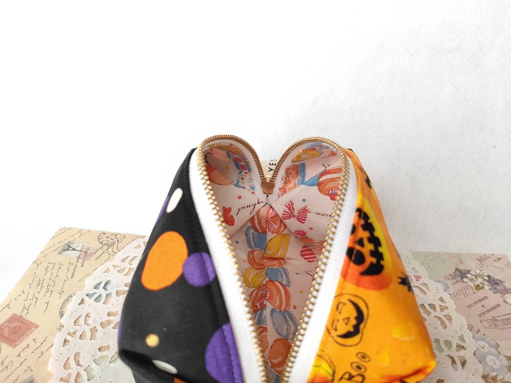 ハロウィン🎃キャラメルポーチ(オレンジ×ブラック)