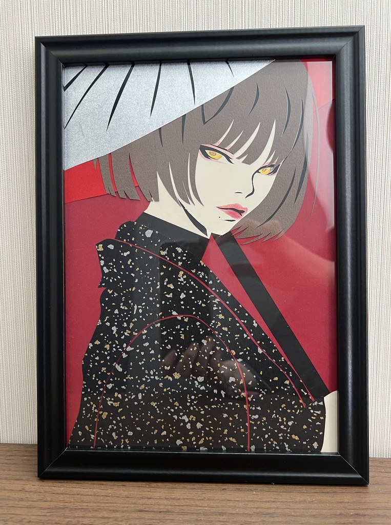 女性の切り絵アート 赤い背景 額縁付き