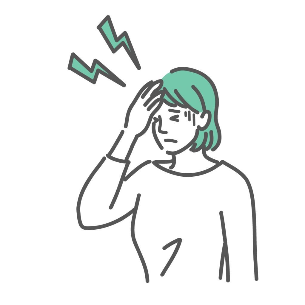 頭痛で頭を押さえている女性