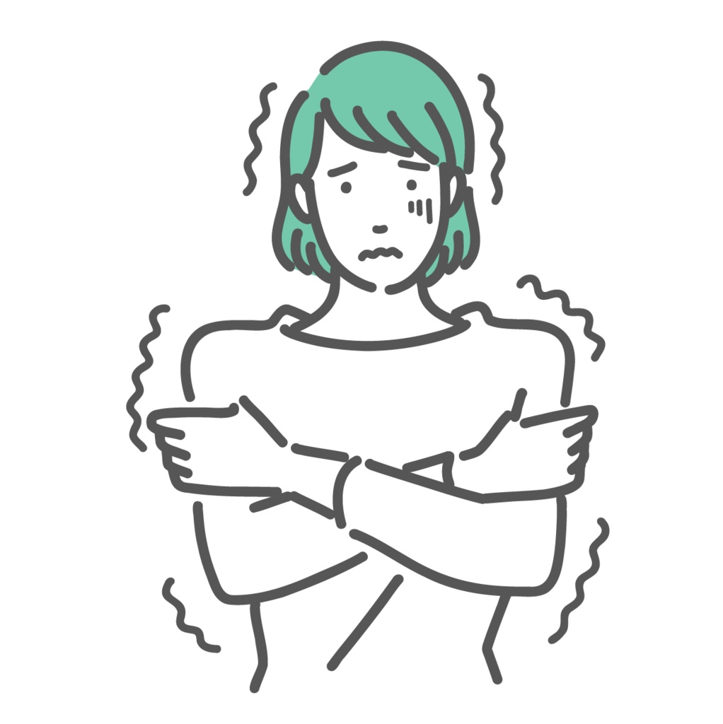 寒気で震えている若い女性