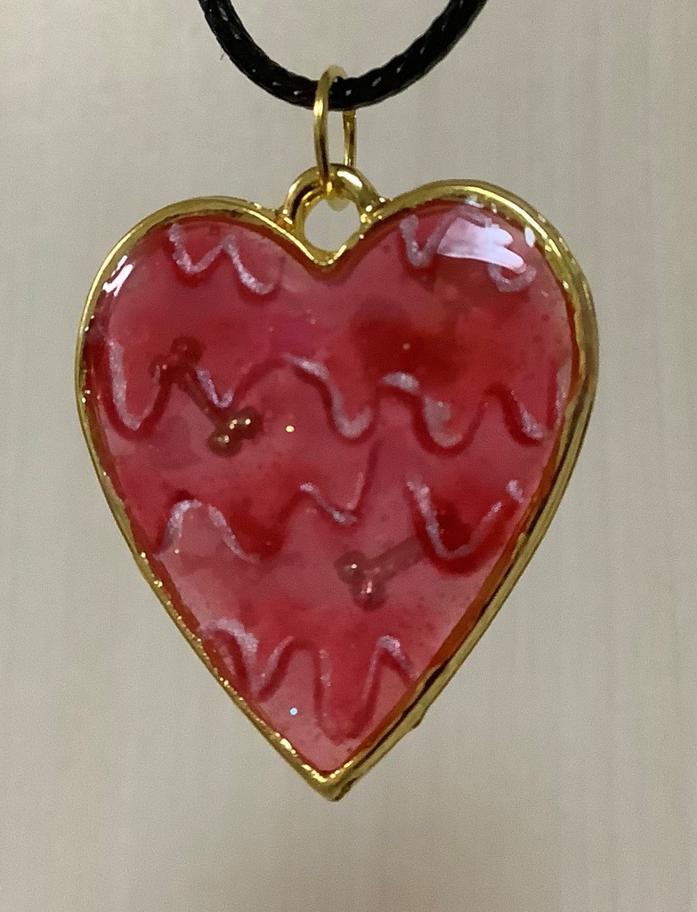 溶けるハートのペンダント