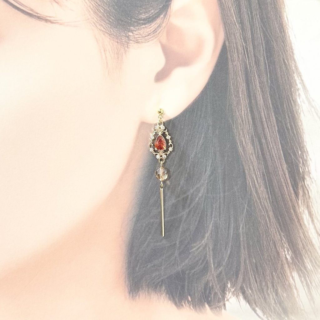 1572アンティーク風の深みオレンジピアス