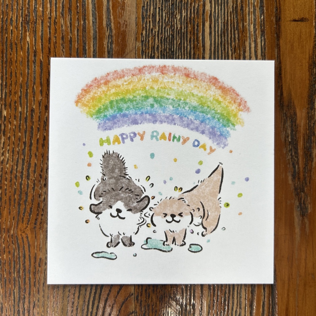 ハガキ　ハガキー子犬とカワウソが雨の中で遊んでいる