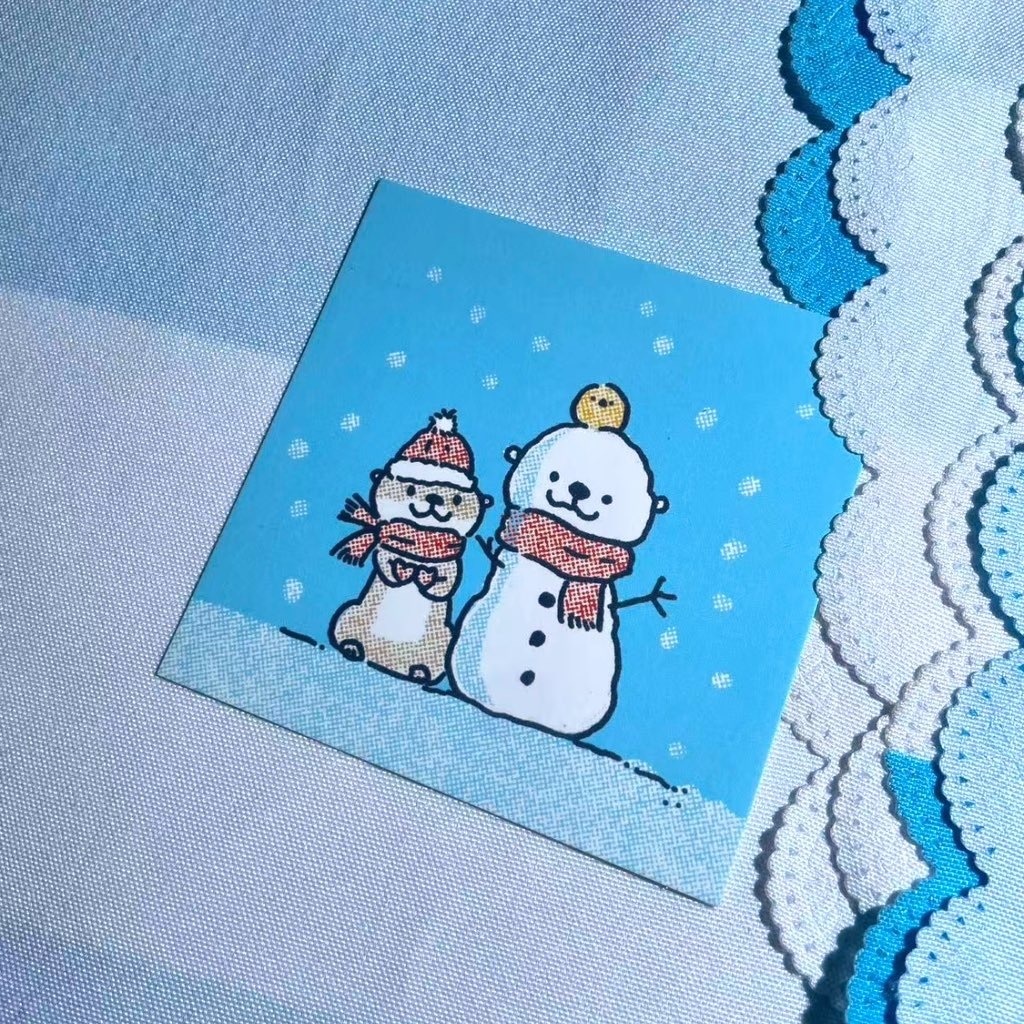カワウソと雪だるま冬のグリーティングポストカード