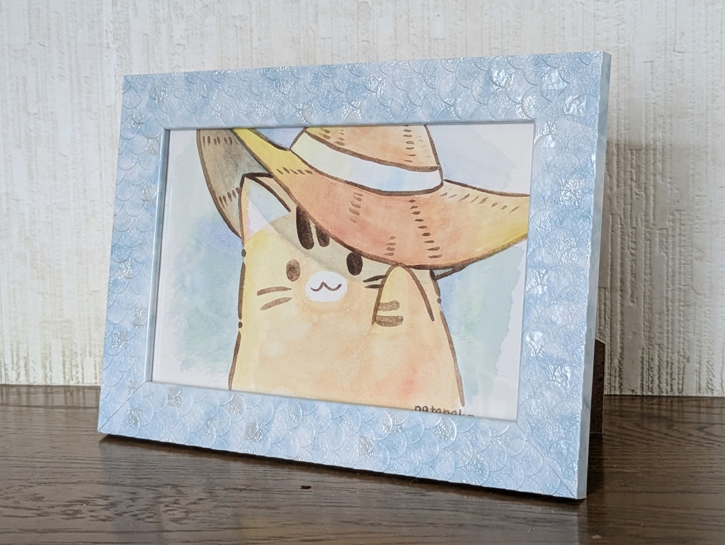 麦わら帽子をかぶるぽてねこ