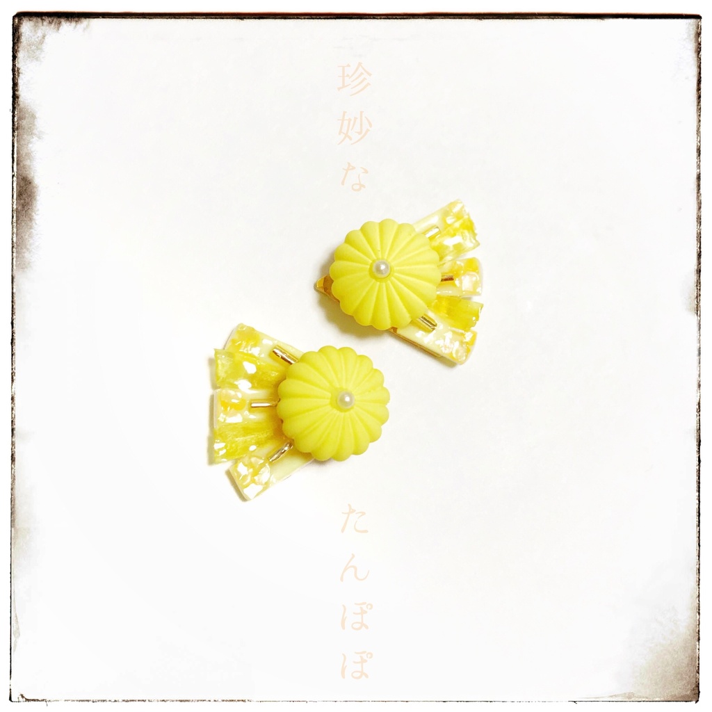 珍妙なタンポポのイヤリング