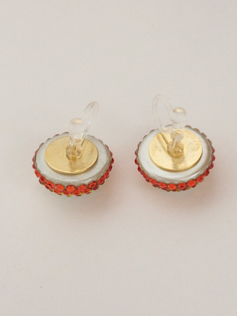 炎イメージの樹脂イヤリング スワロフスキー オレンジ 黄色