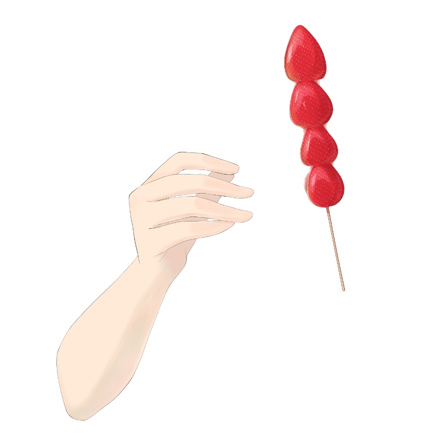 いちご飴を持っている手