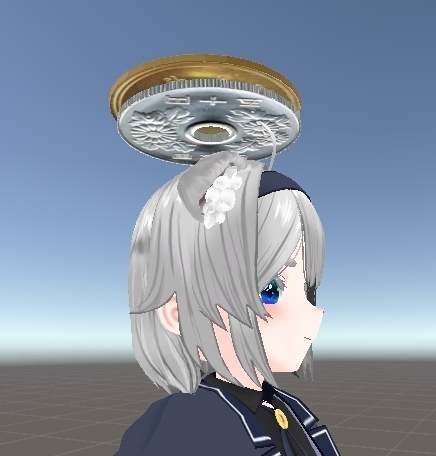 優雅に回転する50円ヘイロー