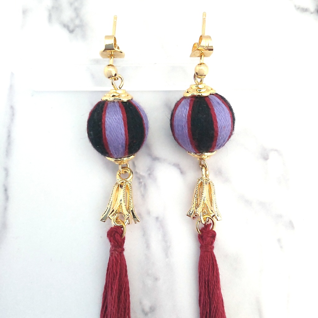 ツイステ ロロ・フランムイメージ 巻き玉とタッセルのピアス・イヤリング