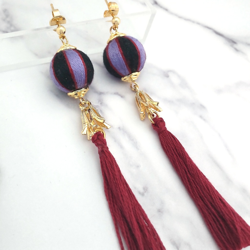 ツイステ ロロ・フランムイメージ 巻き玉とタッセルのピアス・イヤリング