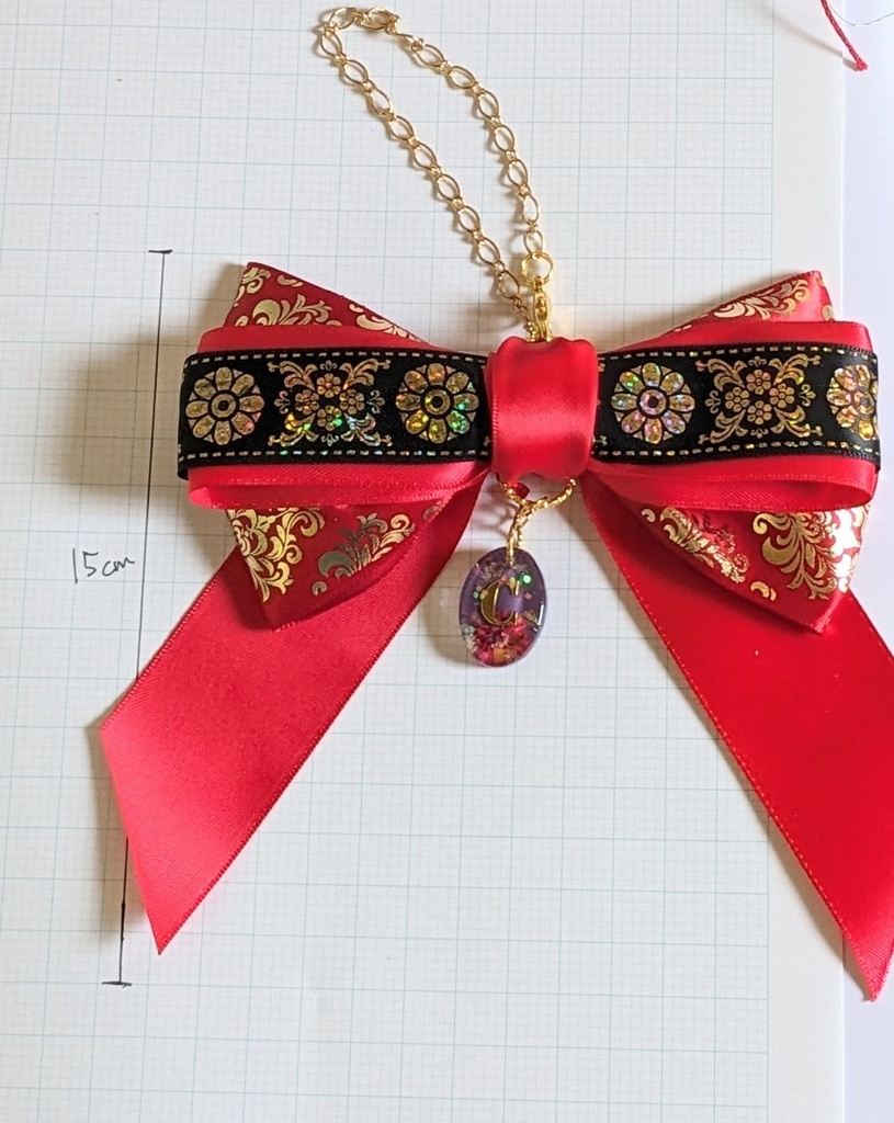 ブラスタ 柘榴イメージリボンバッグチャーム