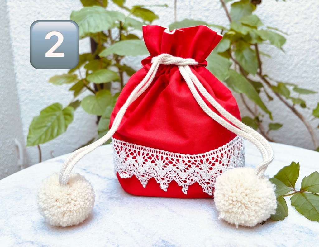 ポンポンつきレース巾着赤