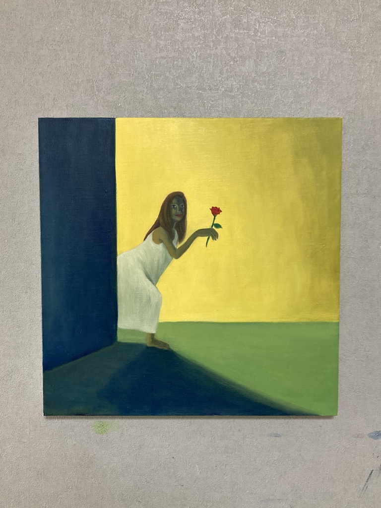 その手に赤いバラを持って