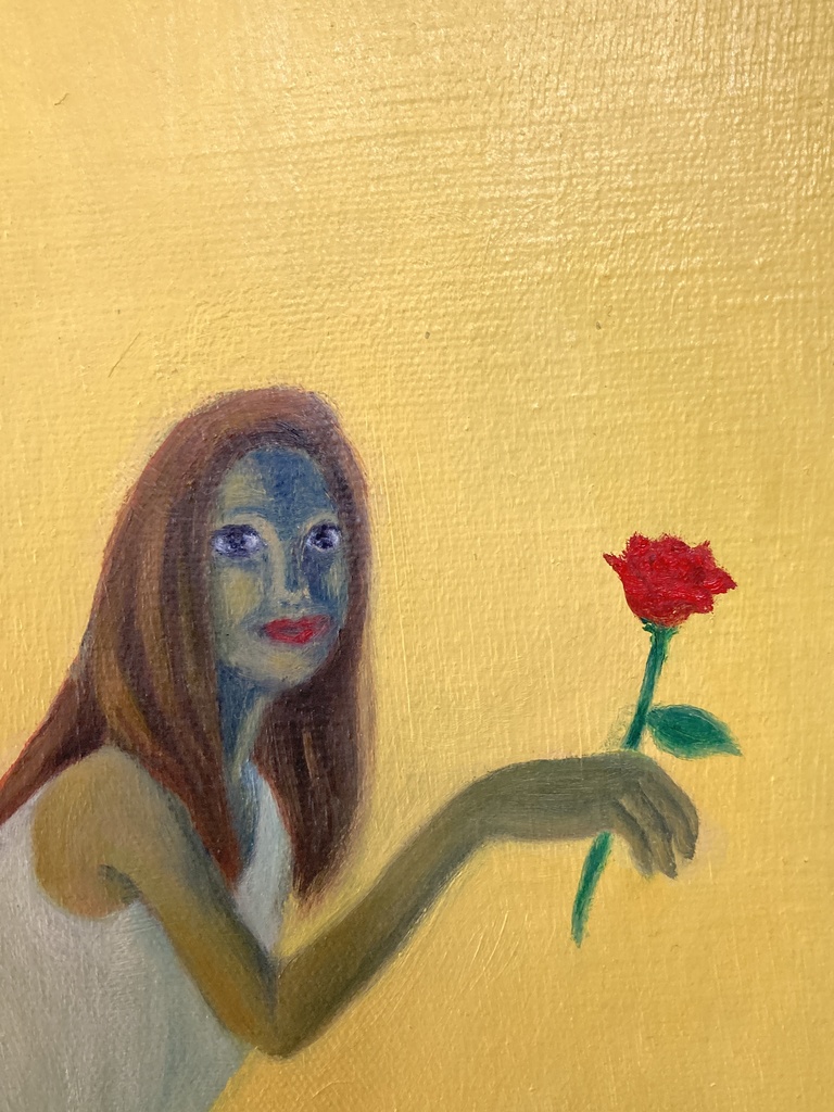 その手に赤いバラを持って