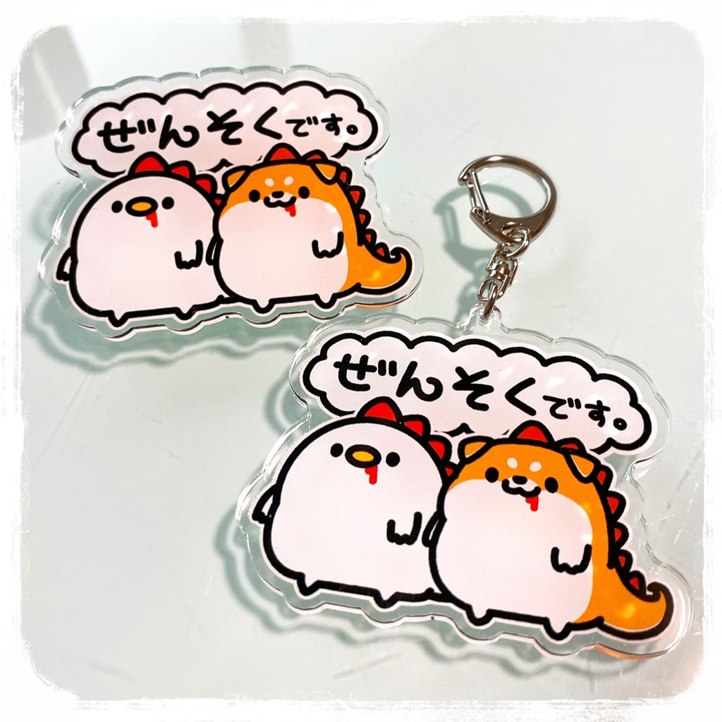 恐竜のような何かバッジ