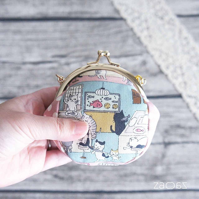 《送料無料》バッグチェーンがま口*猫と回転するお店