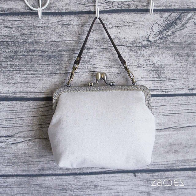 《送料無料》手提げがま口ポーチ*インド刺繍リボン*ホワイト