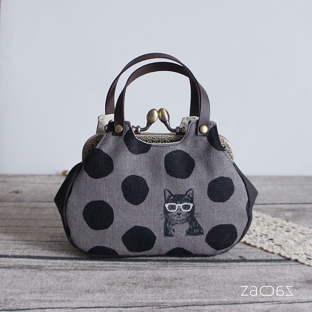 《送料無料》あおりがま口ポーチ*メガネ猫とドット